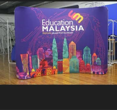 Tension fabric backdrop with a skyline print for an Education Malaysia event